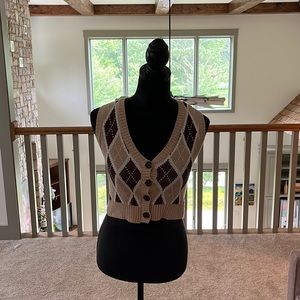 Brown sweater vest
